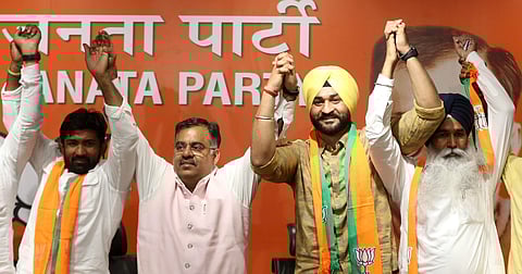 Former Indian hockey captain Sandeep Singh and Olympic medallist wrestler Yogeshwar Dutt and SAD MLA Balkaur Singh joined the Haryana BJP in New Delhi on 26 September 2019. (Photo | Shekhar Yadav, EPS)