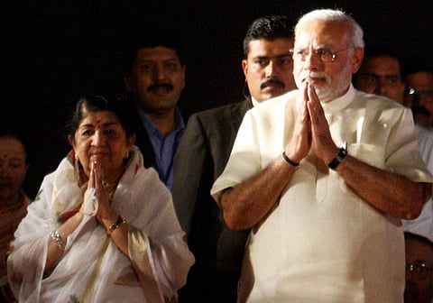 File photo of PM Modi with legendary singer Lata Mangeshkar (Photo | PTI)