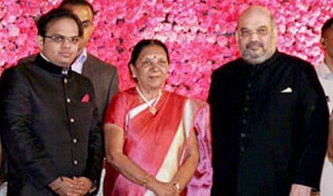 Jay Shah, left, with Ex-Gujarat Chief Minister Anandiben Patel, centre and Amit Shah, right. (File | PTI)