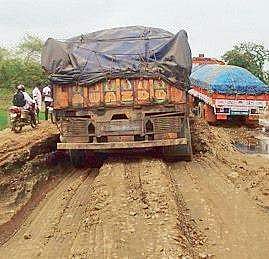 The stretch of NH-353 between Khariar and Nuapada is replete with potholes.