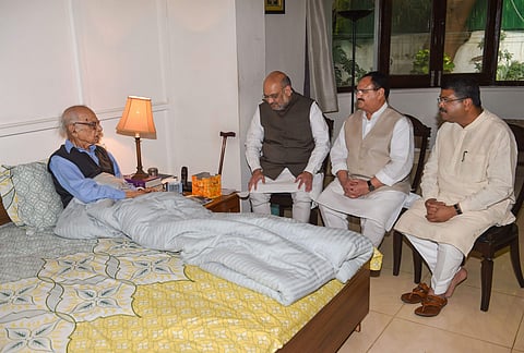 Home Minister Amit Shah meets former J K governor and BJP's veteran leader Jagmohan as party's Working President JP Nadda and Petroleum minister Dharmendra Pradhan look on as a part of party's 'Sampark Abhiyan'. (Photo| PTI)