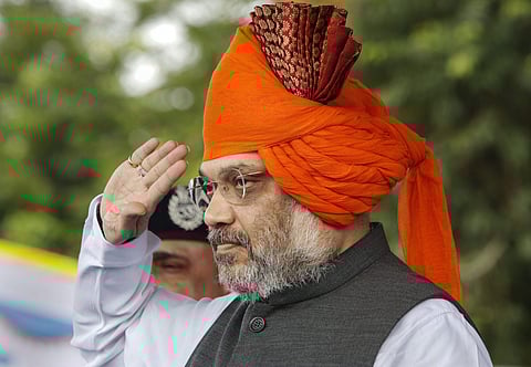 Union Home Minister Amit Shah salute to Rapid Action Force soldiers during 27th Raising day celebrations of Rapid Action Force RAF at RAF HQ in Ahmedabad Monday Sept 30 2019. | (Photo | PTI)