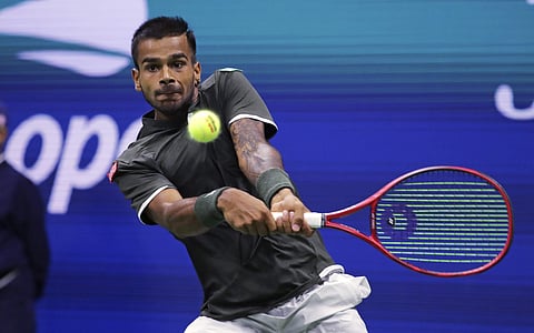 Sumit Nagal of India returns to Roger Federer during their US Open clash. (Photo | AP)