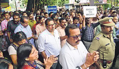 George Alexander Muthoot, managing director of Muthoot Finance Pvt Ltd, participating in the protest by staff against CITU-backed association members who refused them entry to the firm’s head office in Kochi on Tuesday |Albin Mathew