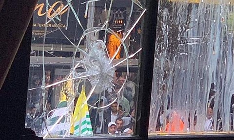 A damaged window pane after protests outside  Indian High Commission in London turned violent. (Photo | @HCI_London/Twitter)