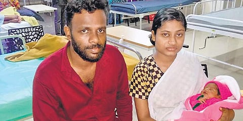 Akhila and Prajeesh with their new born at a hospital at Meppadi in Wayanad.