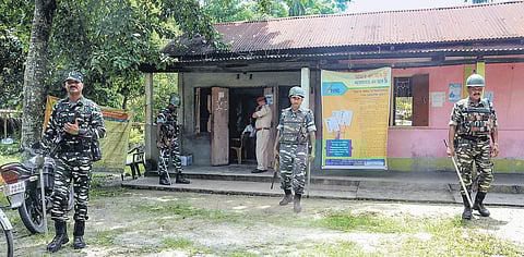 Security personnel keep vigil in front of an NRC Seva Kendra after the release of the final list at Bagan Para in Baska district of Assam on Monday | Pti
