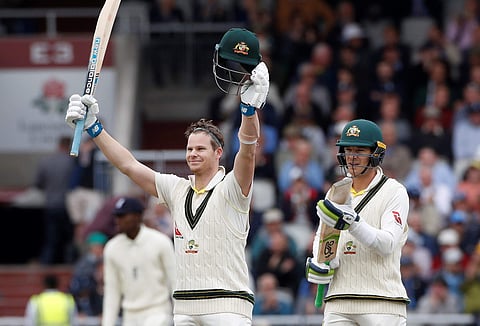 Australia's Steve Smith celebrates after scoring a century along with captain Tim Paine (Photo | AP)