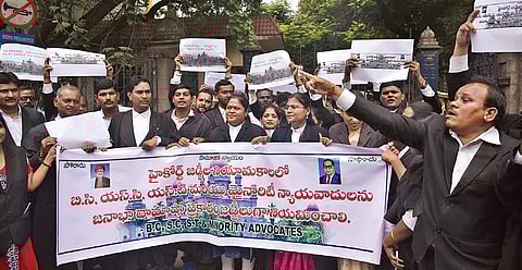 Advocates protest on the Telangana High Court premises, against the transfer of Justice PV Sanjay Kumar on Friday (Photo| EPS, vinay madapu)