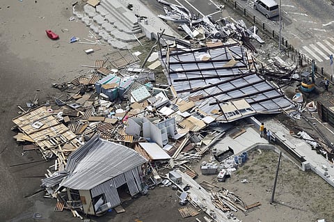 Caption Beach houses are damaged as typhoon hits the beacfront area in Miura, south of Tokyo (Photo | AP)