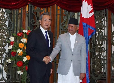 Chinese Foreign Minister Wang Yi (L) with his Nepalese counterpart Pradeep Kumar Gyawali (Photo | Twitter/ @MofaNepal)