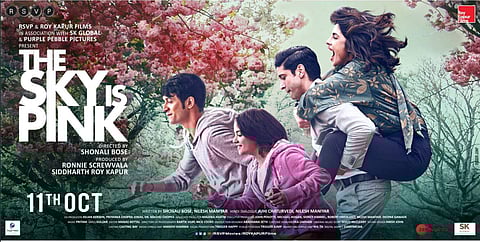 Priyanka Chopra shared the first poster of her upcoming Bollywood film 'The Sky Is Pink' on 9 September 2019, co-starring Farhan Akhtar, Zaira Wasim, and Rohit Saraf. The poster shows Priyanka perched on Farhan's back who is seen giving her a piggyback ride while Zaira and Rohit run ahead of them. It looks like a crazy family journey but it's more than that. Swipe to know more about the real life person it's based on.