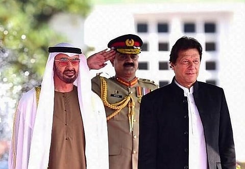 Abu Dhabi's Crown Prince Sheikh Mohamed bin Zayed Al-Nahyan (L) with Pakistan PM Imran Khan (File photo| AFP via Pakistan Press Information Department)