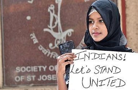 JNC students hold a silent protest in Bengaluru on Thursday I Meghana Sastry