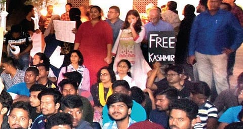 Nalini Balakumar displays the ‘Free Kashmir’ placard at a recent rally | Express