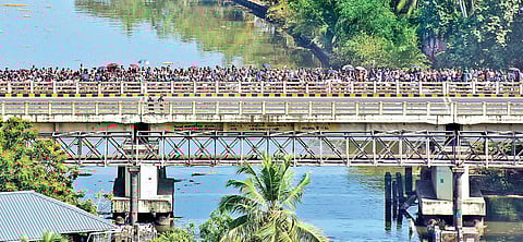 A huge crowd thronged the nearby areas of Golden Kayaloram to watch the high-rise being razed to the ground on Sunday | Albin Mathew