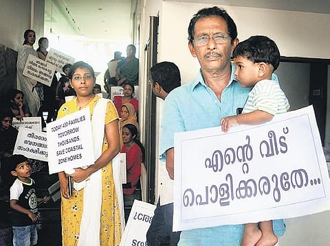 Issac with his granddaughter at a protest.