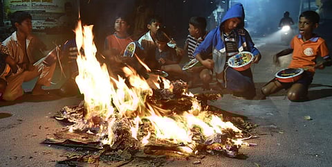 Bhogi pongal is the first day of the four-day Pongal festival celebrated in Tamil Nadu. On this day, people discard their old belongings in a bonfire and celebrate ownership of new possessions. (Photo | EPS, P Jawahar)
