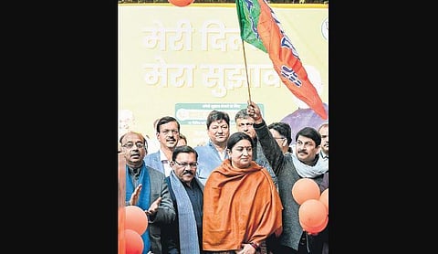 Out of power in Delhi for 21 days, the BJP has pulled out its big guns to take aim at the     AAP and go door to door to curry favour with voters. (File Photo | PTI)