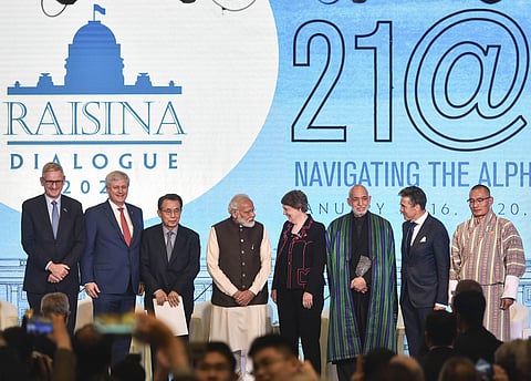 Prime Minister Narendra Modi poses for a group photo with delegates during the inaugural session of Raisina Dialogue 2020 in New Delhi Tuesday Jan. 14 2020. (Photo | PTI)