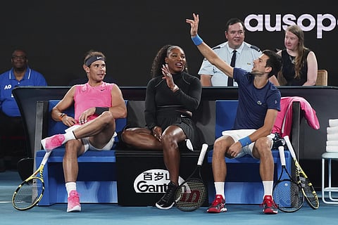 From left, Rafael Nadal, Serena Williams and Novak Djokovic participate in the Rally For Relief at Rod Laver Arena in Melbourne. (Photo | AP)