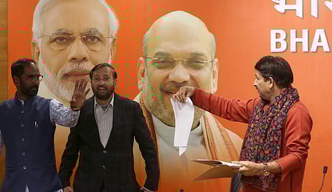 Delhi BJP president Manoj Tiwari along with Union minister Prakash Javadekar released the first Delhi Assembly election candidate list at BJP HQ in New Delhi on Friday. (Photo | Shekhar Yadav, EPS)