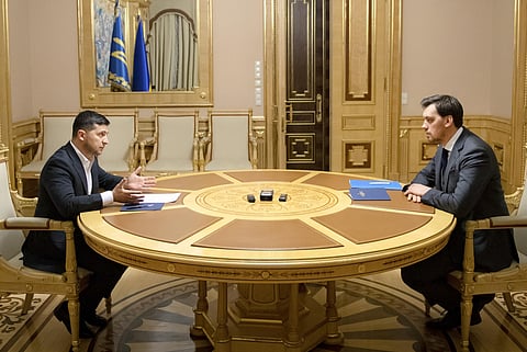 Ukrainian President Volodymyr Zelenskiy, left, talks with Ukraine's Prime Minister Oleksiy Honcharuk in Kyiv, Ukraine. (Photo | AP)