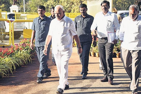 Chief Minister BS Yediyurappa arrives for the cabinet meeting at Vidhana Soudha, in Bengaluru on Friday