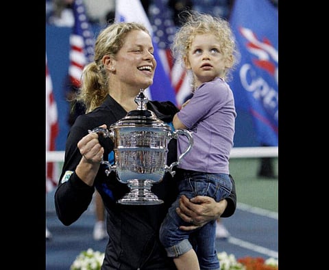Kim Clijsters of Belgium with her daughter Jada after winning the women's championship at the US Open in 2010. (File Photo | AP)