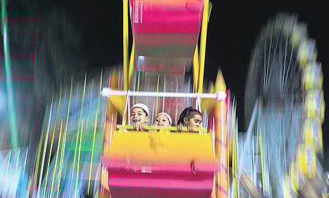 Children at the 80th edition of All India Industrial Exhibition at Nampally exhibition ground on Wednesday. (Photo |S SENBAGAPANDIYAN/EPS)