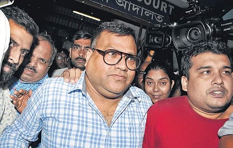 IPS officer SMH Mirza (centre) comes out after being produced by CBI officers in connection with Narada sting operation case, in Kolkata. (Photo | PTI)