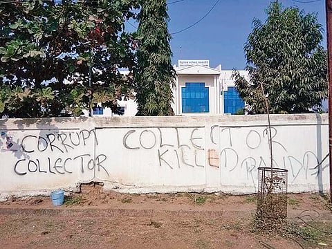 Grafitti on walls of collectorate in Malkangiri. (Photo | Express)