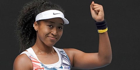 Japan's Naomi Osaka celebrates after defeating Marie Bouzkova of the Czech Republic in their first round singles match the Australian Open tennis championship in Melbourne. (Photo | AP)