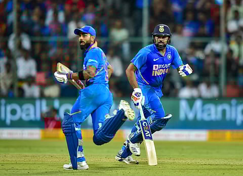 India's Rohit Sharma and Virat Kohli run between the wickets during the third and final ODI cricket match against Australia at Chinnaswamy Stadium in Bengaluru. (Photo | PTI)