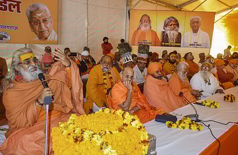 Jagadguru Swami Vasudevanand Saraswati Ji Maharaj speaks on first day of Kendriya Margdarshak Mandal Baithak organized by VHP as part of the ongoing one-month-long annual traditional Hindu fair 'Magh Mela' at Sangam in Prayagraj on Monday. (Photo | PTI)