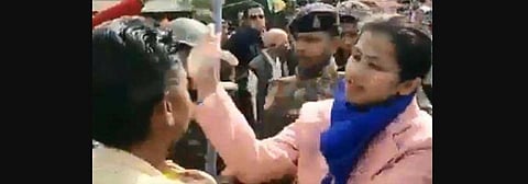 Additional collector Priya Verma taking on some men who were part of the crowd. (Photo | Twitter Screengrab)