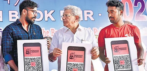 CPI(M) All India Secretary Sitharam Yechury releases the mobile app of Marxist Library at the Book Fair in Chennai | p jawahar