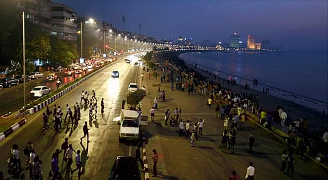 People gather at Mumbai Marine Drive on the New Year eve. (File Photo | PTI)