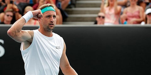 Tennys Sandgren of the U.S. celebrates after defeating Italy's Matteo Berrettini his second round singles match at the Australian Open tennis championship in Melbourne. (Photo | AP)