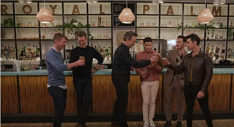Seth and the Jonas Brothers - along with Jack McBrayer and Seth’s brother, Josh Meyers - spend a day drinking at The Royal Palms Shuffleboard Club while concocting brother-themed drinks, playing brother-themed drinking games and writing pop songs. (Photo 