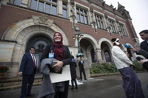 Tun Khin, President of the Burmese Rohingya Organisation UK (R) and Yasmin Ullah of the Rohingya community outside the International Court of Justice. (Photo | AP)