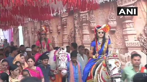 Sakshi and Srishti took out their own 'baraat' and rode horses to reach houses of their grooms in Khandwa, as a tradition followed by the Patidar community. (Photo | ANI)