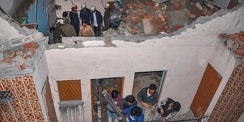 Around 30 students, all minors, were attending classes at the coaching centre when the two upper floors of the four-storey building collapsed, trapping them under the debris. (Photo | PTI)