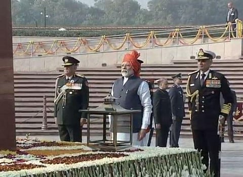 PM Modi leads the nation in paying tributes to the fallen soldiers, by laying a wreath at National War Memorial. (Photo | ANI)