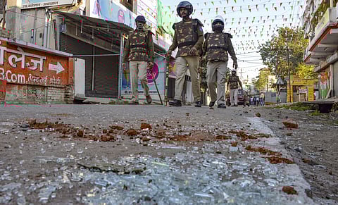 Police personnel patrol a street after an alleged confrontation between two communities during a pro-CAA protest in Jabalpur Sunday Jan. 26 2020. (Photo | PTI)