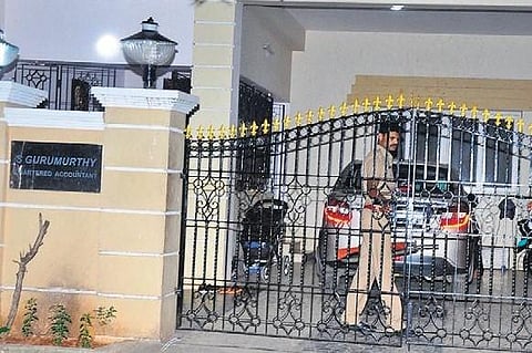 Police personnel on security detail at S Gurumurthy’s house in Mylapore. (Photo| EPS)