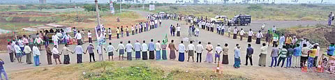 Villagers formed human chain and blocked all ways leading to Seed Access Road at Mandadam junction in Amaravati protesting against the State government’s three-capital proposal. (File Photo| EPS/Prasant Madugula)