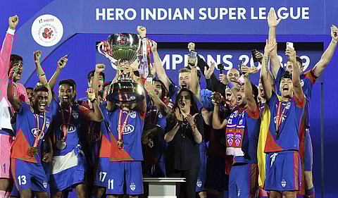 Bengaluru FC's player celebrate with the winning trophy after beating Goa FC in the ISL 2019 football final match . (Photo | PTI)