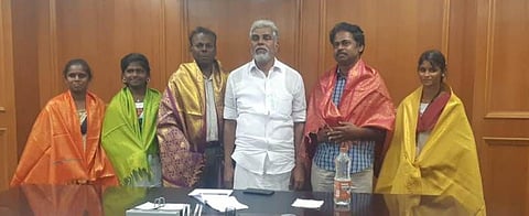 Education Minister R Kamalakannan lauded the three students for their achievement. (Photo | EPS)