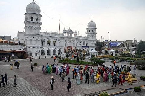 Sikh pilgrims visit the shrine in Nankana Sahib, some 75 kms west of Lahore on November 7, 2019, on the occasion of the 550th birth anniversary of Guru Nanak Dev. (File | AFP)